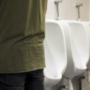 Man at urinal