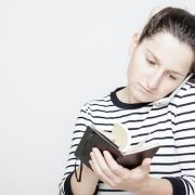 Woman with phone and diary